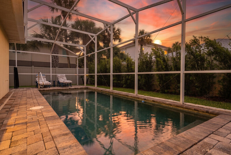 Sunset over the pool — the Lighthouse, New Smyrna Beach