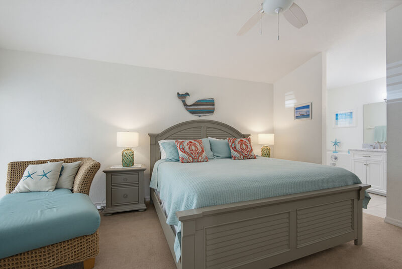 Screened lanai & back yard — the Lighthouse, New Smyrna Beach