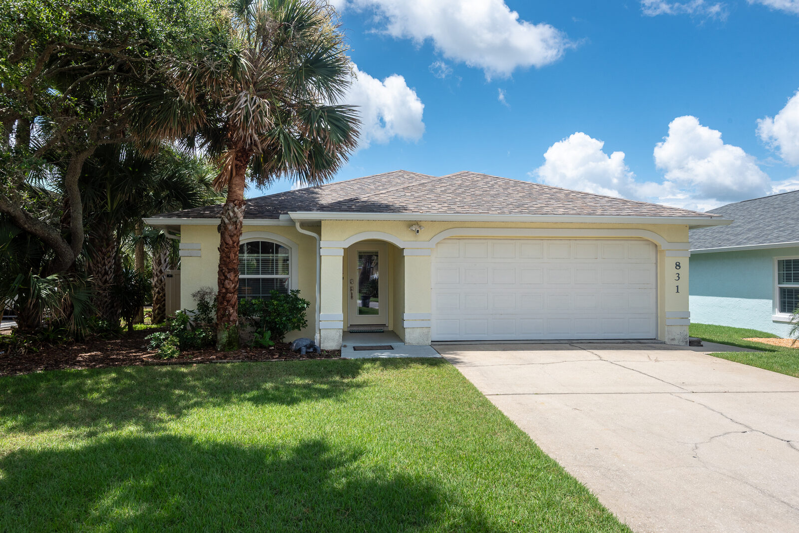 The Lighthouse — a private single-story pool home, two minutes from the sand in New Smyrna Beach, Florida